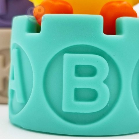 WOOPIE Klocki Sensoryczne Układanka Piramida do Ściskania Wody Dźwięk Nauka Alfabetu Kaczuszka 7 el.